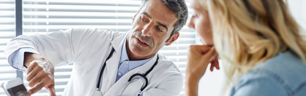 Physician talking to a patient