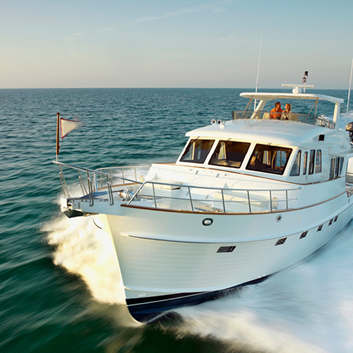 Large yacht cruising on open water