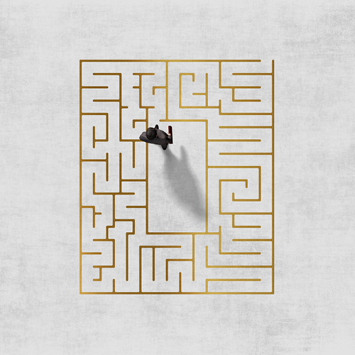 gold maze with 3D human walking through it