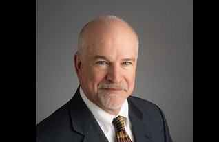 Headshot of Commerce Trust's Dennis Burns