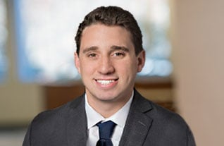 Headshot of Commerce Trust's Sam Toigo