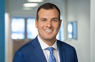 Headshot of Commerce Trust's Brennan Hampton.