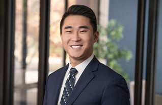 Headshot of Commerce Trust's Sam Kim.