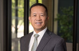 Headshot of Commerce Trust's Nong Lin.