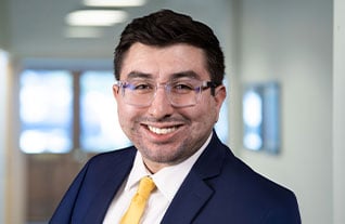 Headshot of Commerce Trust's Sergio Tekeli.
